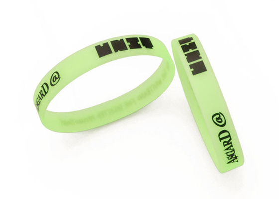 China Buy custom glow in the dark silicone wristband with green/blue/red light supplier