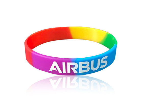 China Segmented Sports Silicone Wristbands Debossed In Fill Colors For Women Men supplier